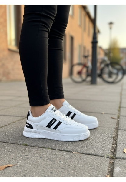 Kadın Beyaz Siyah  Detaylı Şeritli Kalın Tabanlı Spor Ayakkabı 849₺ city2